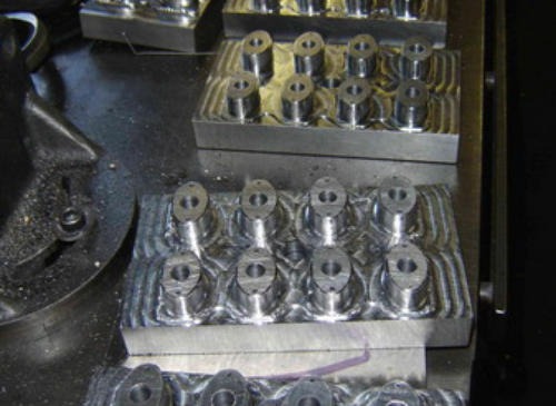 Machined array of closure cores
